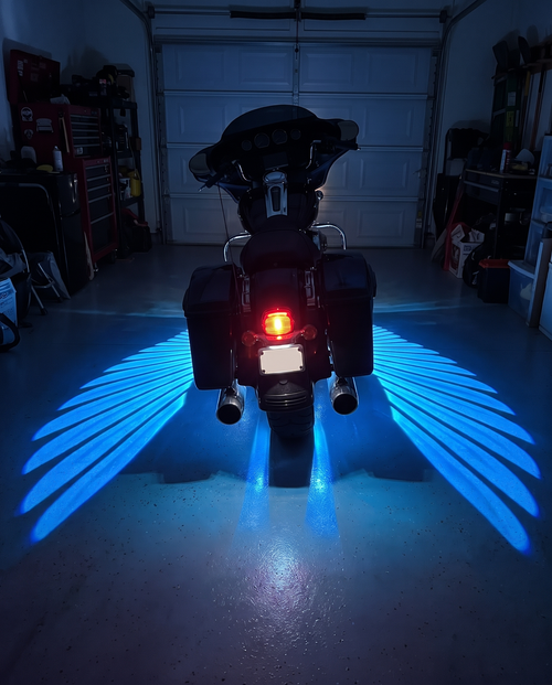 Cyber Blue wings under a bagger in a garage
